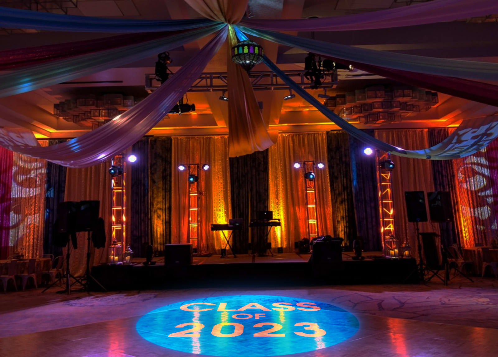 Real photo of event venue with orange drapes