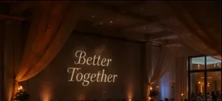 "Mr & Mrs" projection over an elegant candlelit reception — Infinity Projectors