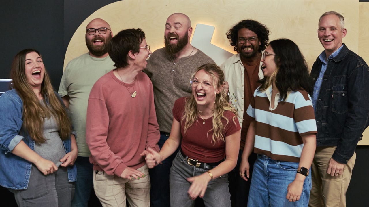 Brittany Ellich, Bailey Townsend, Dame, Jason Lengstorf, Bryn Newell, Jared Pereira, Zeu Capua, and Jim Ray on the set of Web Dev Challenge laughing together