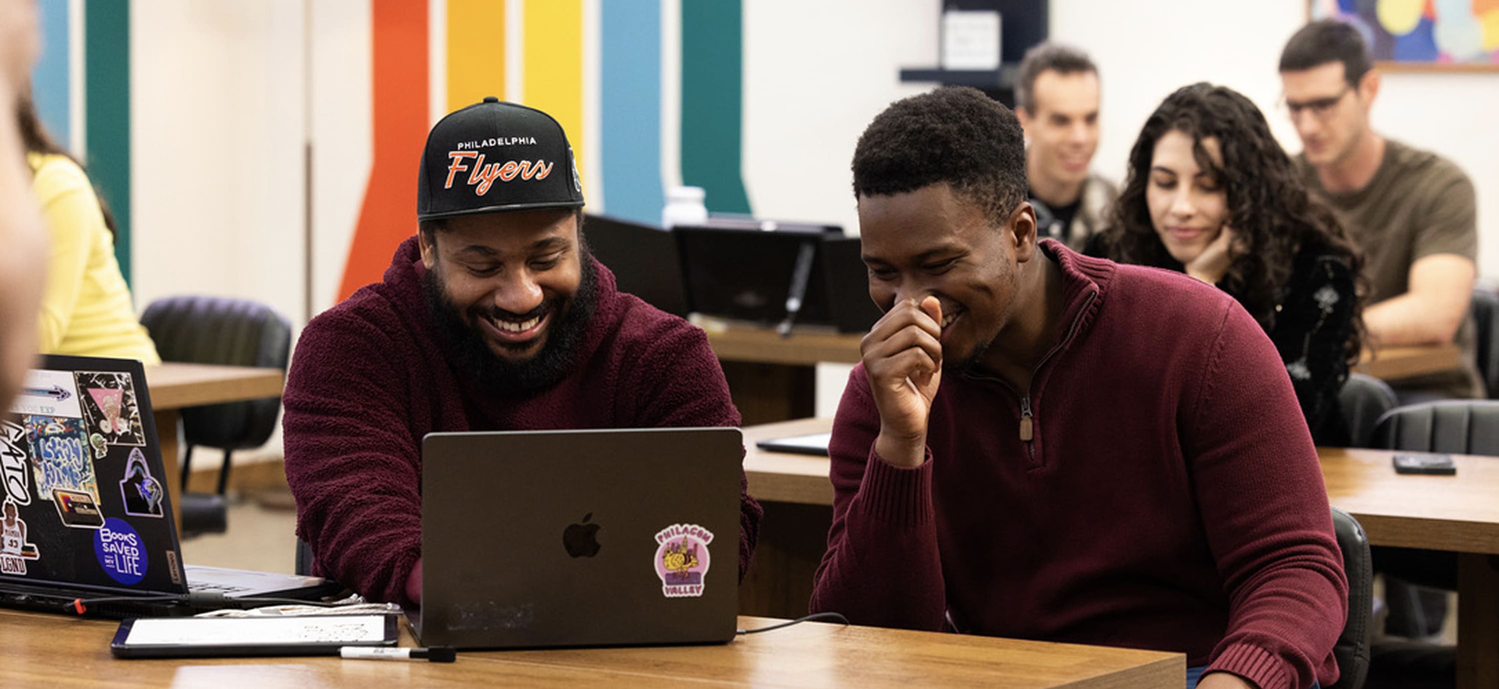 Victor and Aziz laughing on the set of The Full Stack