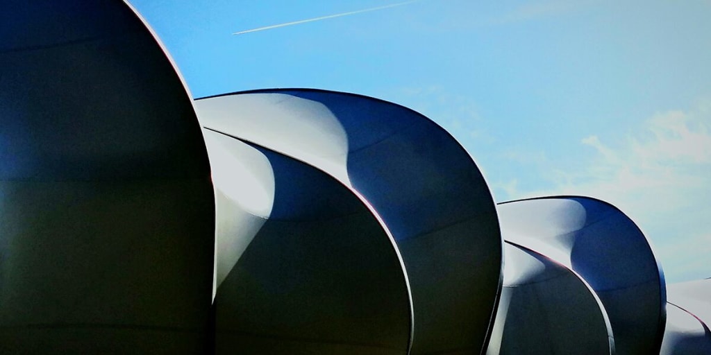 commercial real estate building architectural detail against blue sky