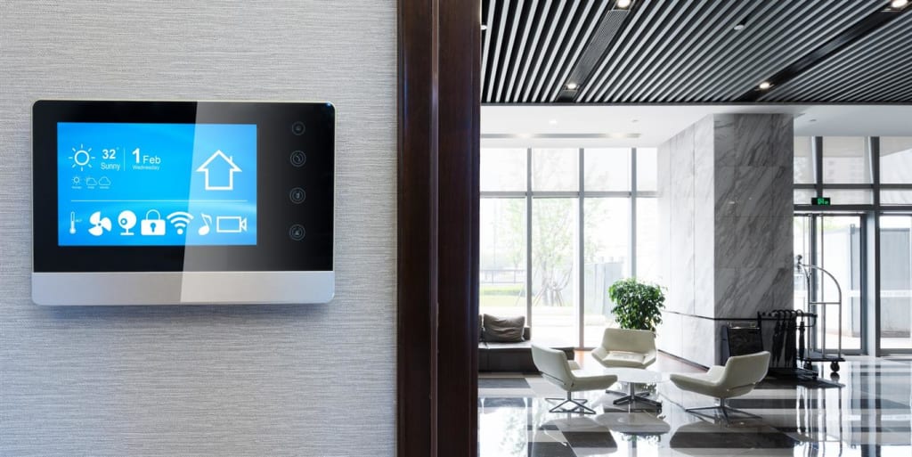 A smart technology keypad in a CRE building