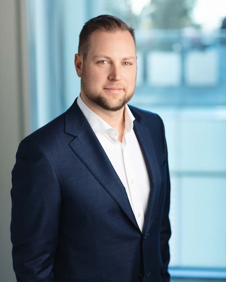 Portrait of Corbin MacDonald, Vice President at JLL in Vancouver