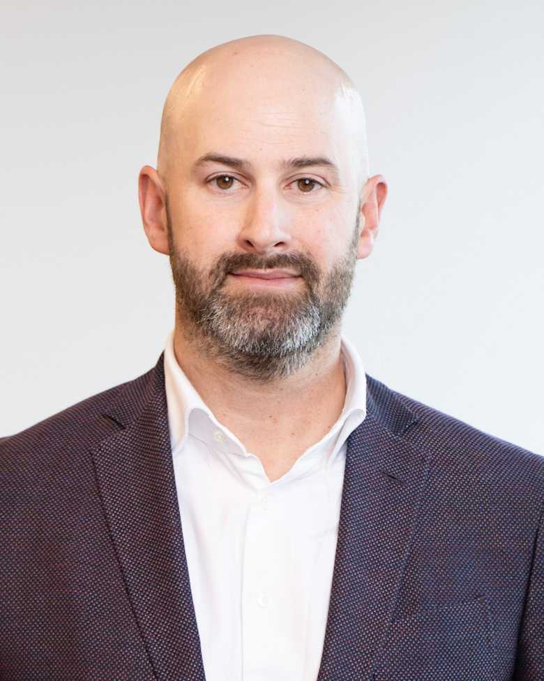 Portrait of Chris Canuel, Vice President, Retail at JLL in Toronto