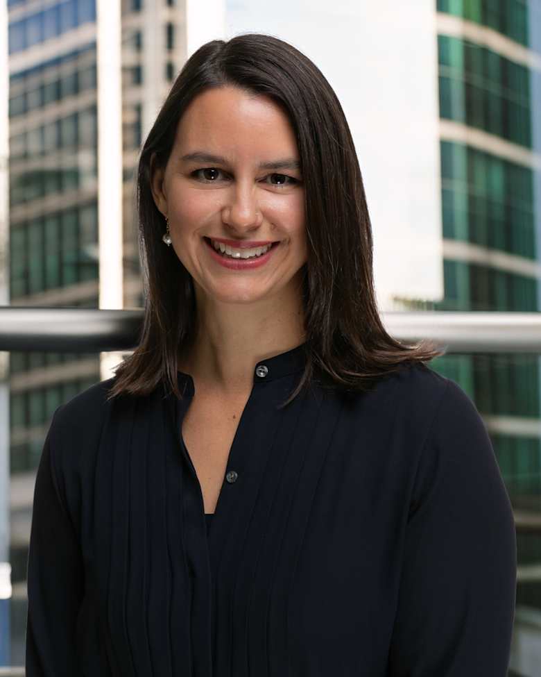 Portrait of Jessica Mogilka, Executive Vice President at JLL in Minneapolis