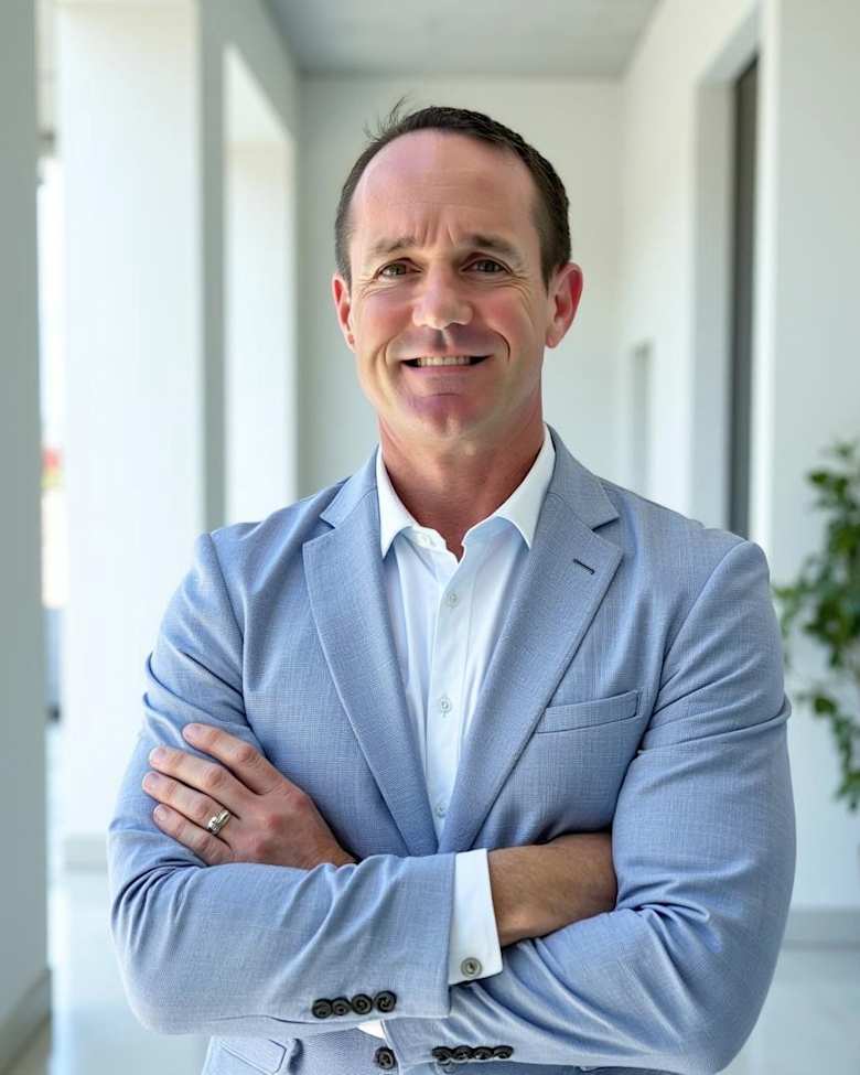 Portrait of Micah Strader, Managing Director at JLL in Orlando