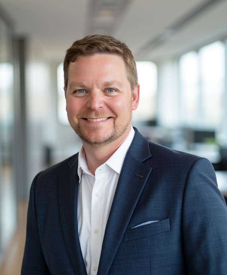 Portrait of Adam Chapman, Managing Director at JLL in Seattle