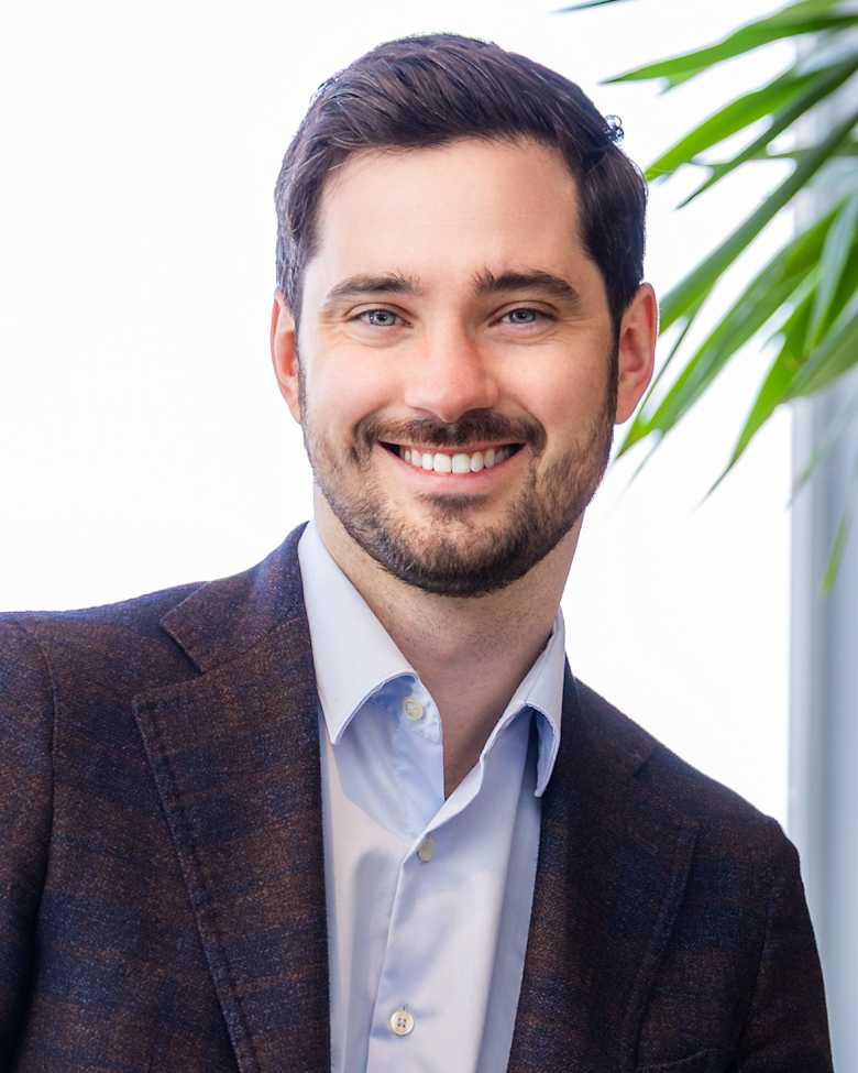 Portrait of Jake Sinclair, Associate Vice President at JLL in Montreal