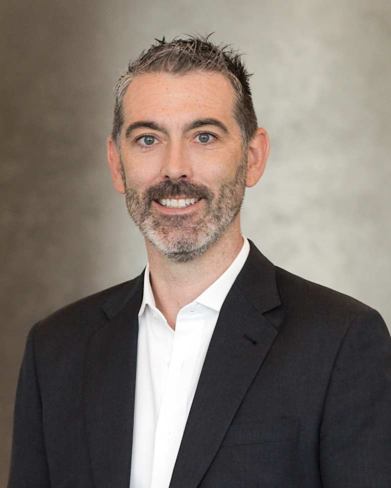 Modern looking tiled floor background with sunlight and shadow