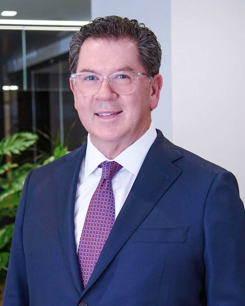 Portrait of John Huguenard, Senior Managing Director, Industrial Group Leader at JLL in Miami
