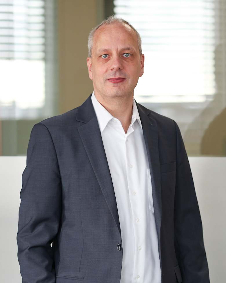 Portrait of Christian Giesemann, Senior Director Research at JLL in Berlin
