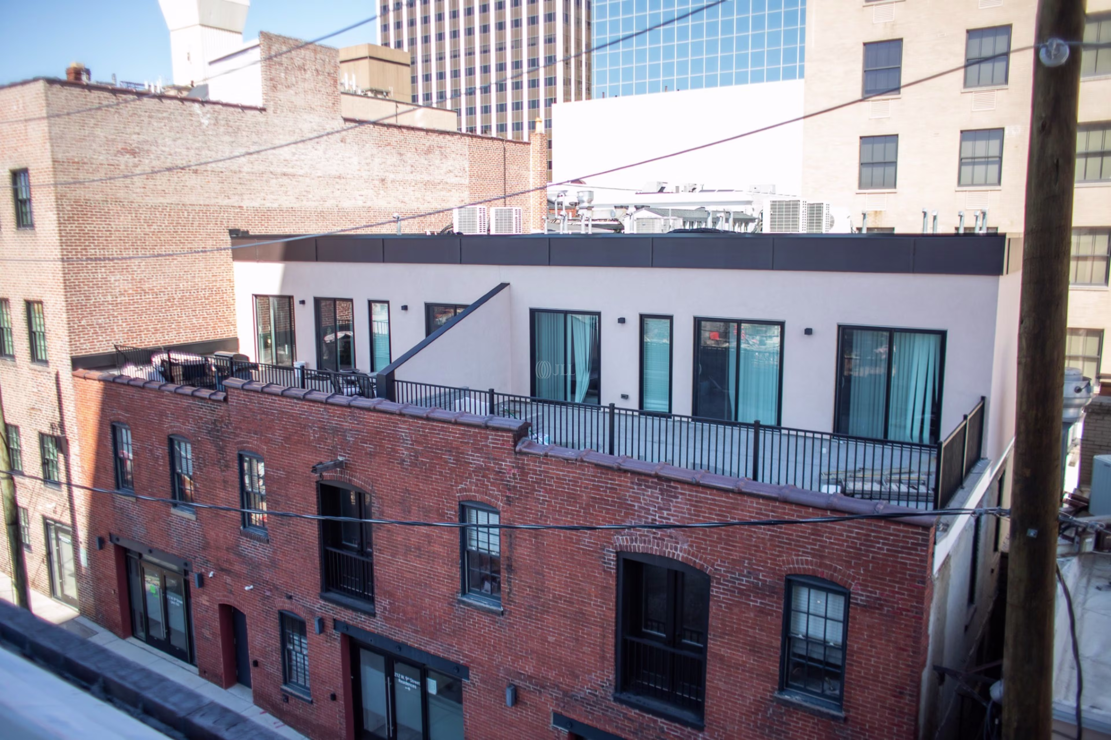 210-212 W 9th St