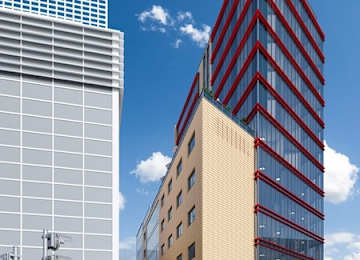 An office building with a clock in Rzeszów