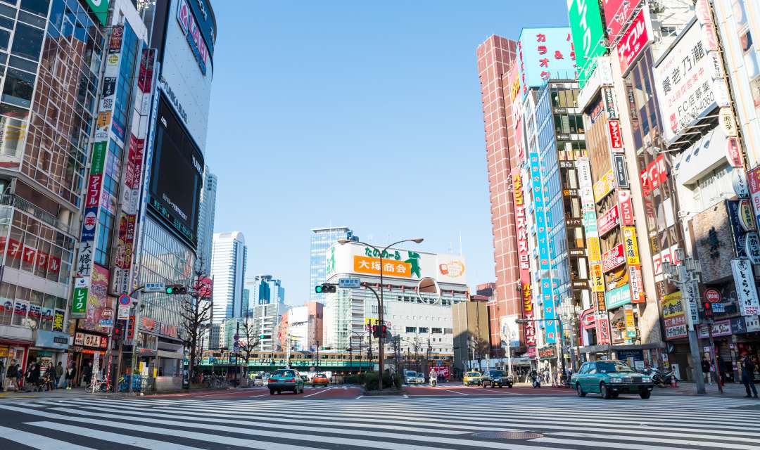 Timelapse of crowds of people crossing roads in Shibuya district