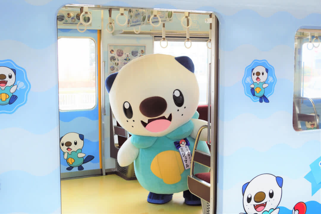 Mie Prefecture’s ‘Support Pokémon’ Oshawott standing inside the new Oshawott Train in Mie Prefecture