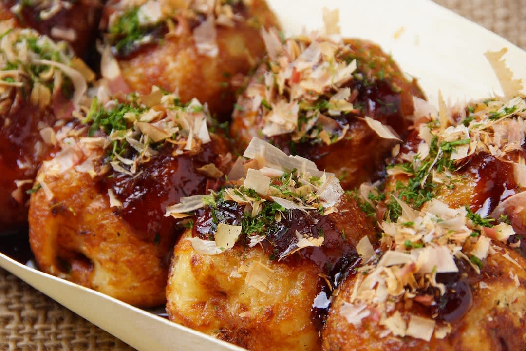 Takoyaki, a savoury snack sometimes referred to as ‘octopus balls’ in English.