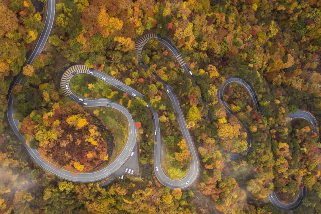 Aerial of narrow and winding street in Hosoomac