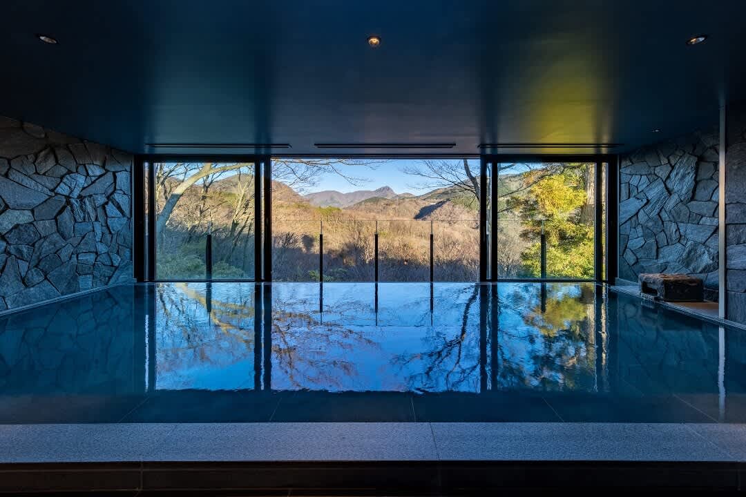 Large public natural hot spring bath with mountain views at FUFU Hakone, a new luxury mountain resort in Kanagawa Prefecture