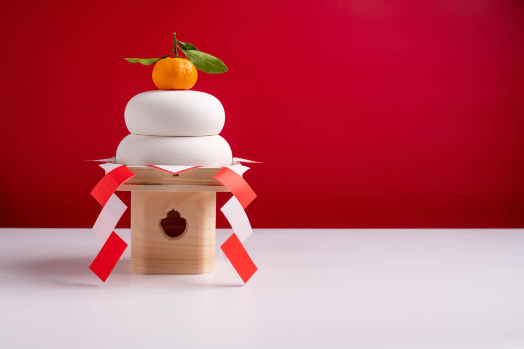 Kagami mochi, a traditional Japanese new year decoration of two pieces of rice cake topped with a bitter orange