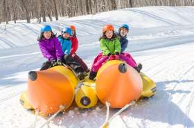 Children inclusive snow banana boat in Kiroro Resort of Hokkaido