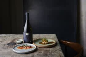 table with food and black liquor