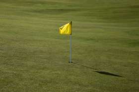 A yellow flag in golf club in japan