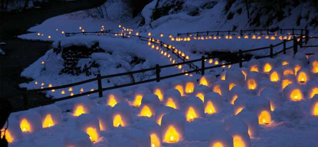 Kamakura with candles lit inside in Yunishigawa Onsen Kamakura Festival