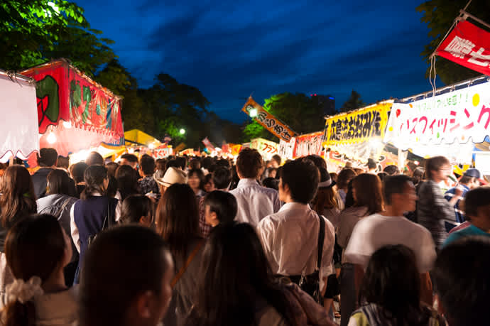 The festival stalls get jam-packed as evening falls