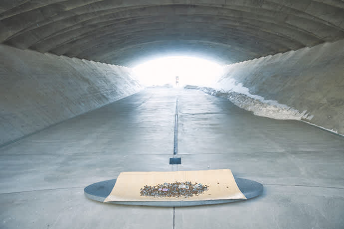 A tunnel inside the hill leads visitors between the secular and sacred worlds.