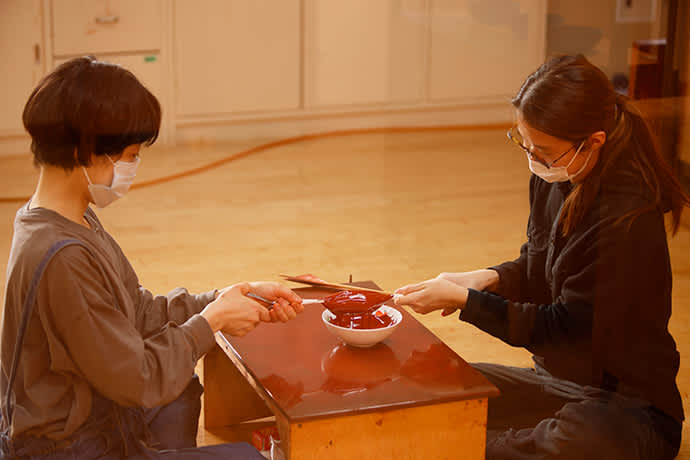 Artisans filtering lacquer. The city of Ninohe is committed to training new generations of lacquer tappers.