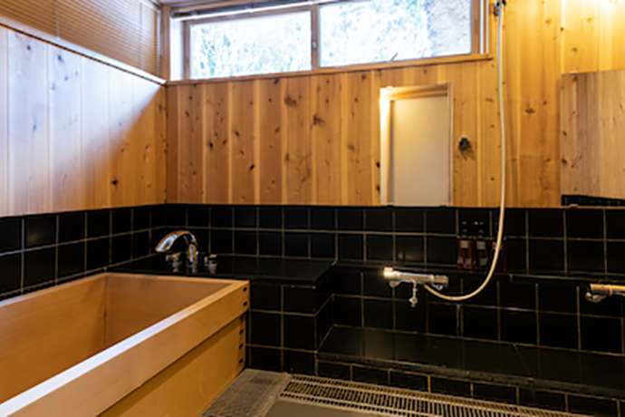 In addition to a bathroom with a cypress tub, there is a shower room as well.