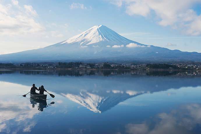 Canoeing on Lake Kawaguchi. On clear days, Mt. Fuji is reflected in the water.