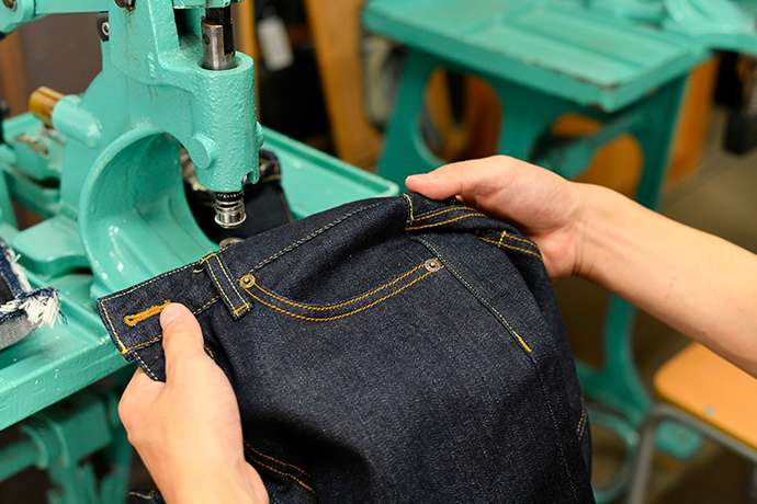 Some denim artisans still use pedal-driven machines. Children can operate one, too, if supervised by an adult.