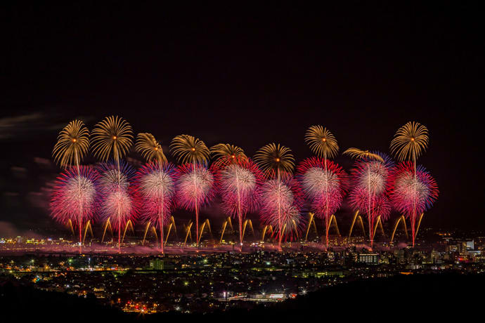 Fireworks along the banks of the Shinano River at the Nagaoka Fireworks Festival