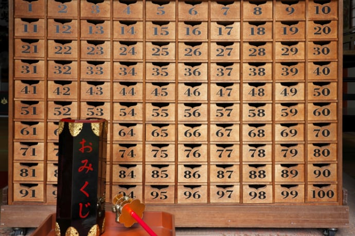 At some shrines, shrine maidens hand you the Omikuji directly