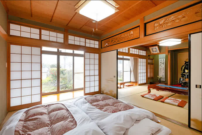 Sleeping on futons laid out on tatami mats is a quintessential Japan experience.