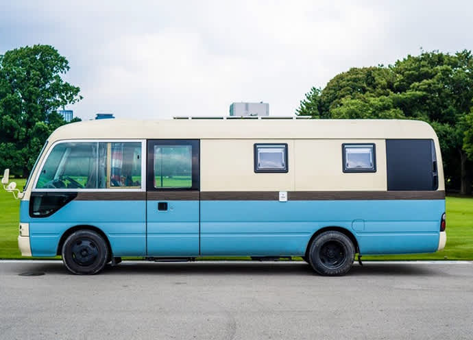 Converted buses become “traveling hotels.”