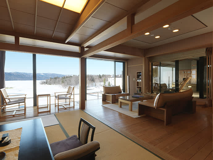 The spacious living room in the Ama no Za suite has views across Lake Akan.