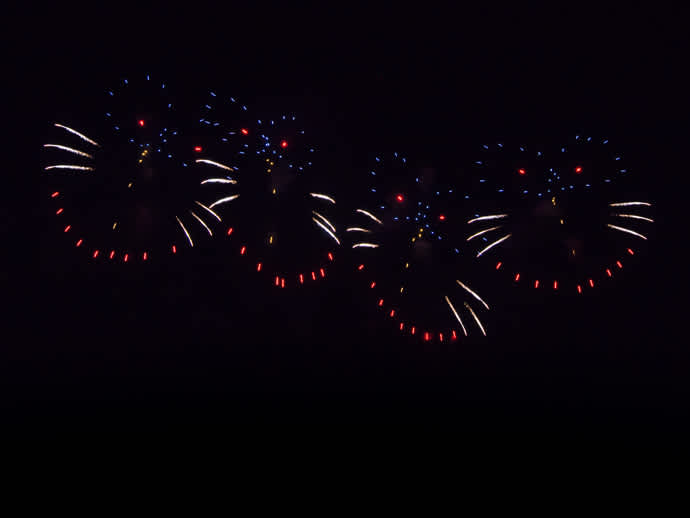 A katamono firework exploding in the sky