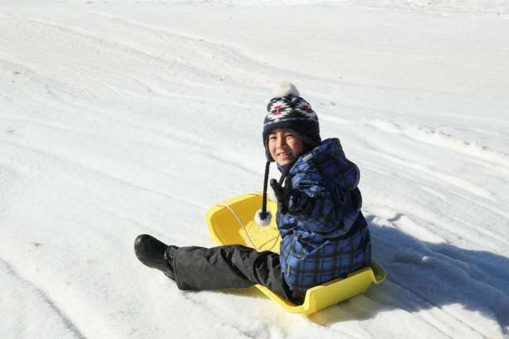 Skiing and Snow Play with Children