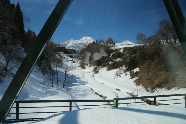 viewing of winter scene through the windows of a sightseeing train