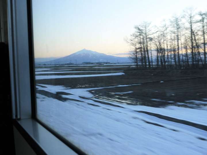 viewing of winter scene through the windows of a sightseeing train