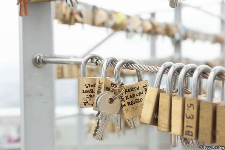 attach a padlock to the fence as a symbol of their lasting love at the Mid Station of Mt. Moiwa Ropeway