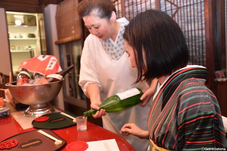 Drink sake in the Nagarekawa entertainment district in Hiroshima city