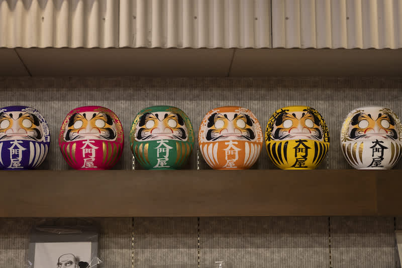 row of daruma