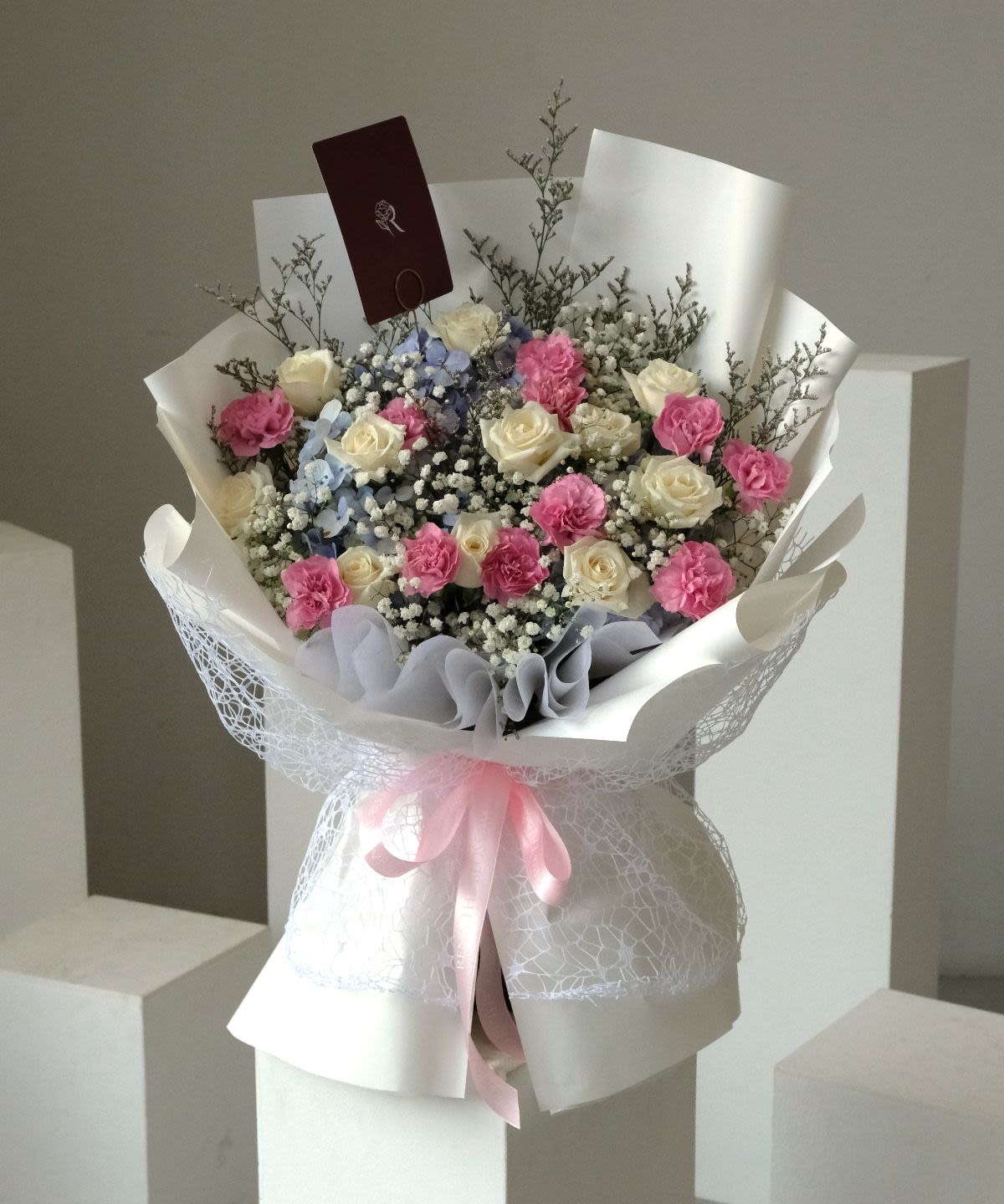 Cotton Candy Bloom - Blue hydrangeas, white roses & pink carnations — sweet, light, and genuinely lovely. - Rena The Blossom Jakarta