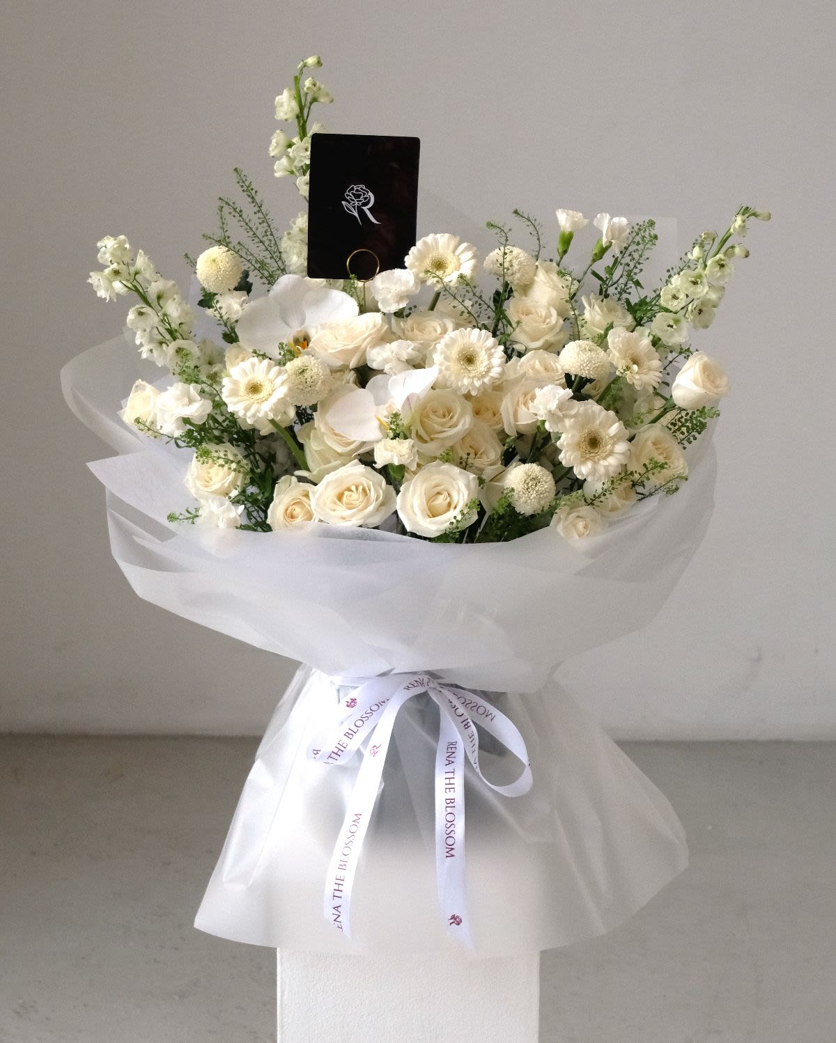 Fallen Grace - White delphinium, garbera & roses with orchid — fallen grace and peace. - Rena The Blossom Jakarta