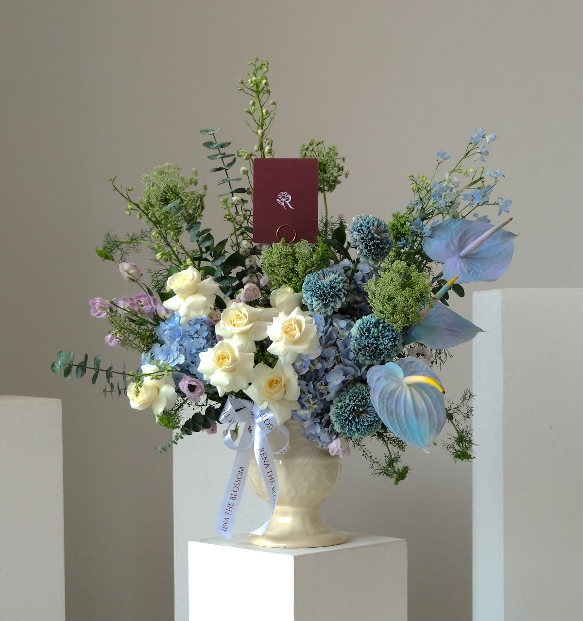 Stillwater - Blue anthurium, gompie & hydrangea with delphinium — quiet stillwater depth. - Rena The Blossom Jakarta