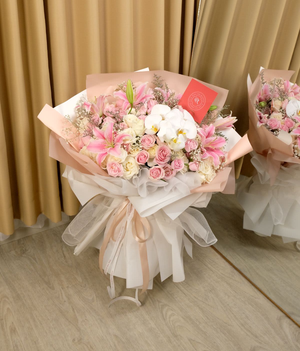 Lush Elegance - Roses, lily, orchid & baby's breath in pink & white — earned, layered lushness. - Rena The Blossom Jakarta
