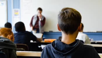 a group of people in a classroom